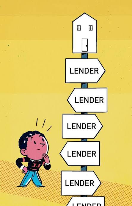 A homebuyer meeting with a mortgage lender to review loan options