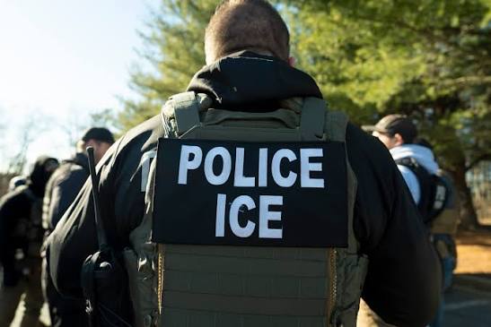 ICE agents on a worksite raid