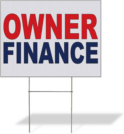 Owner-finance agreement documents on a desk